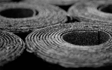 Bossington bitumen roof disadvantages